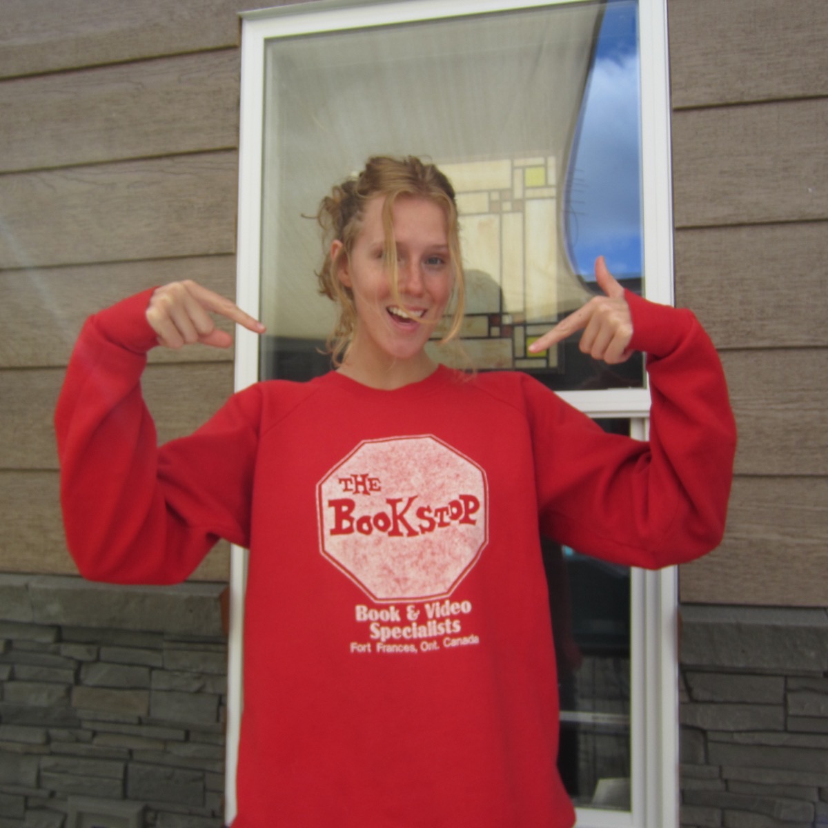 Grace wearing The Book Stop vintage sweatshirt in Fort Frances